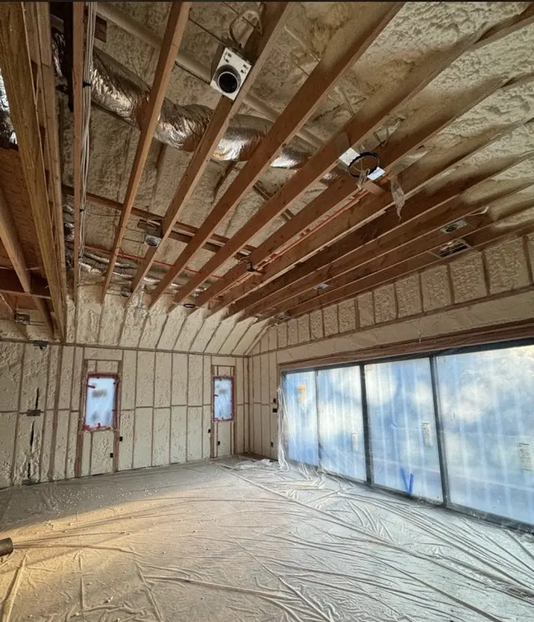 Interior walls and ceiling insulated with spray foam during new construction in Anderson Creek